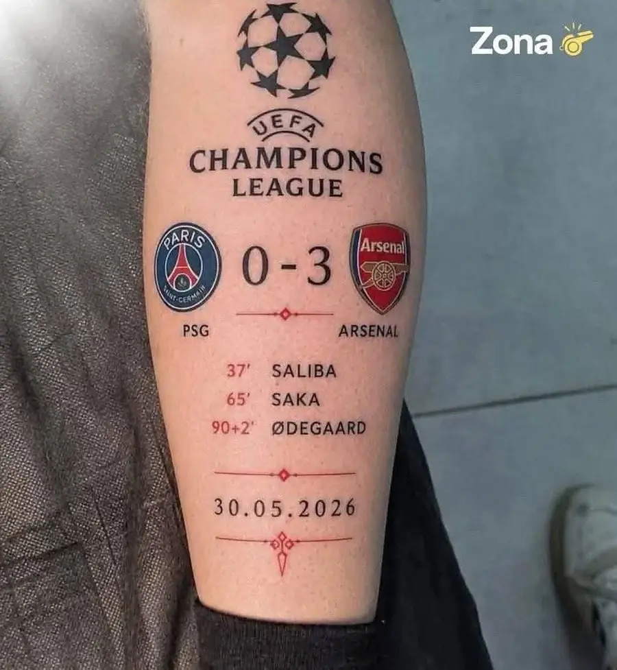 A fine line record of a Champions League final score tattooed on a calf